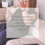Woman holding her phone with a surprised expression, illustrating automatically checking social media out of habit.